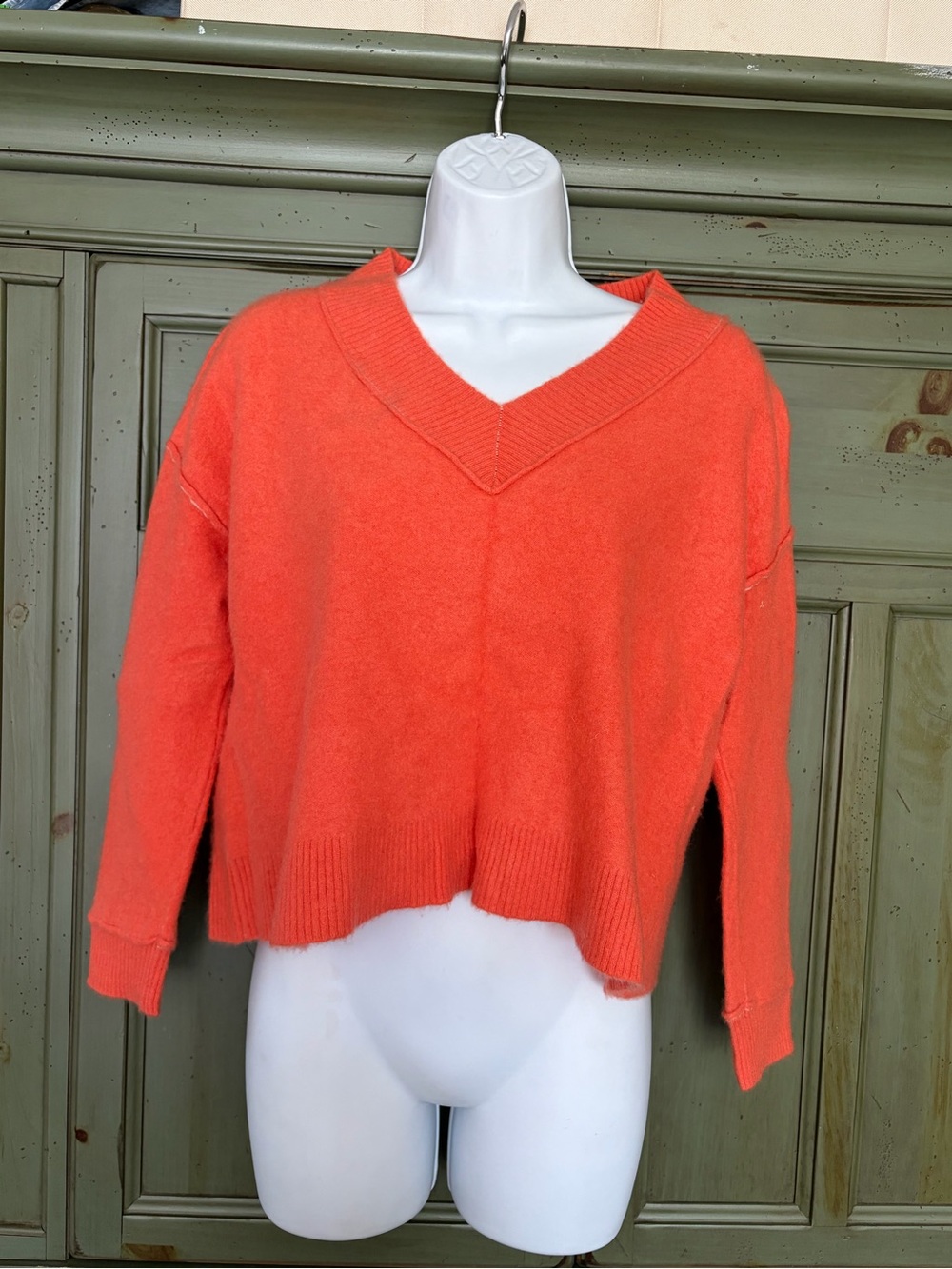 Pilcro V-Neck Cropped Sweater in Coral Orange